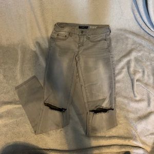 Grey Jeggings with tips on the knees